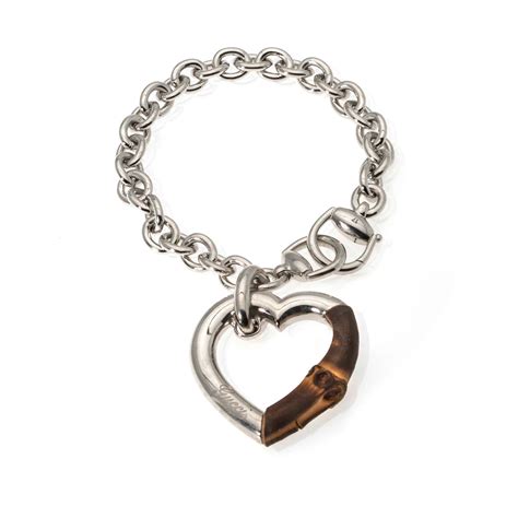 gucci bamboo bracelet with silver heart|Gucci interlocking silver bracelet.